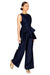 Model walking to the right showing the side view of the wide leg trousers in navy