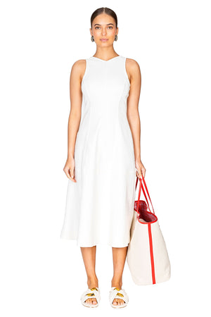 Model styled wearing the white arlet sleeveless dress in stretch twill.