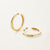 Ghost image of the slim doune hoops in yellow gold. 