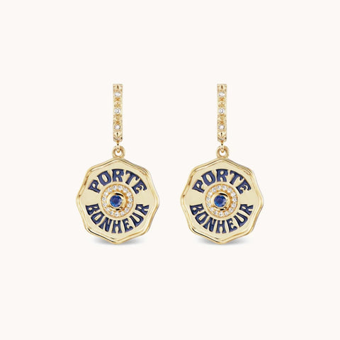 Yellow gold porte bonheur earrings with navy enamel, diamonds and blue sapphire.