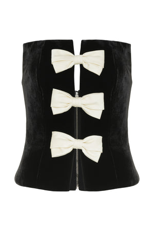 Black bustier with bow details in velvet with silk bows.