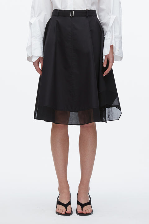 Up close of black midi belted skirt with chiffon layer.