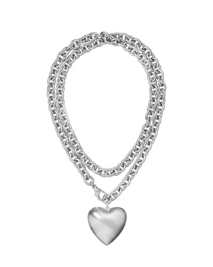 Silver chain necklace with large heart pendant.