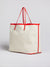 Back side of the janis medium tote bag with red leather straps.