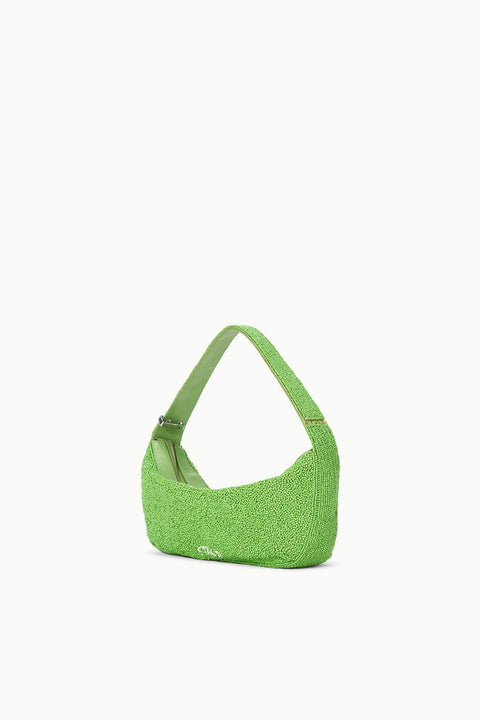 Side view of a green beaded slouchy shoulder bag. 