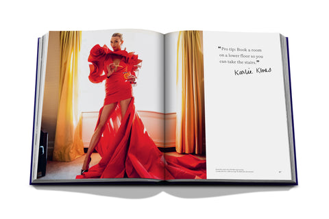 Open book showing a woman in a red dress from "The Mark"