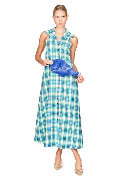 Woman wearing a blue and green checkered dress holding a blue fish bag on a white background front