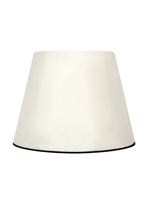 A white taffeta mini skirt with black stitching