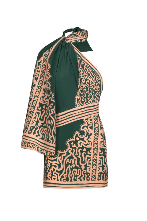 A green and salmon patterned draped sleeve mini dress with a halter tie-neck