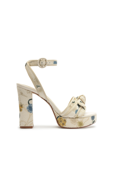 Platform woven heel with floral design on a white background