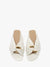 Top view image of the cream slides with gold chain link detail.