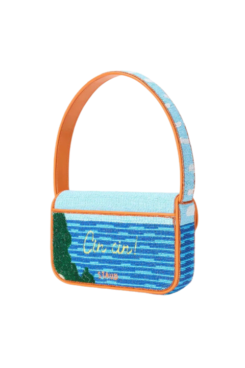 Beaded handbag with a beach scene and the words 'cin cin' on the back