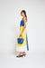 Model facing the left in the colorblock midi skirt