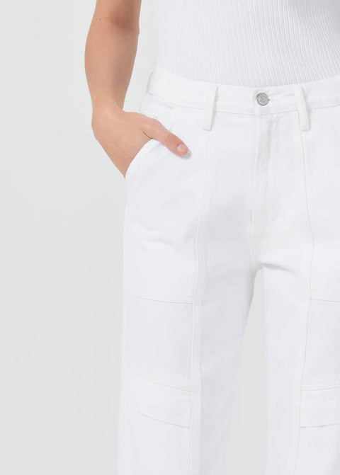 A close-up image of the Cooper Cargo Jean, showing the button closure and pocket.  