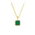 Close-up view of the emerald pendant on a yellow gold chain, showing its square shape and bold Emerald stone