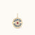 Close up look at the Porte Bonheur charm with blue enamel, ruby, and a diamond halo